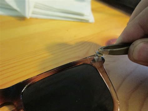how to repair broken glasses hinge